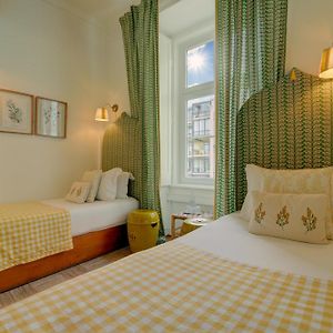 Kleine Kamer met een Queen Size Bed